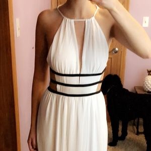 NWOT White maxi dress with cut outs.